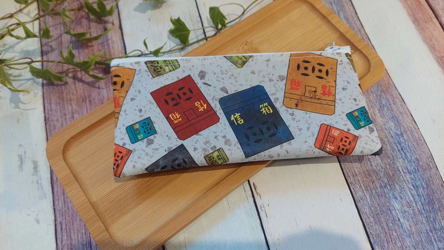 unique Hong Kong culture souvenirs featuring zipper pencil cases with traditional letterboxes